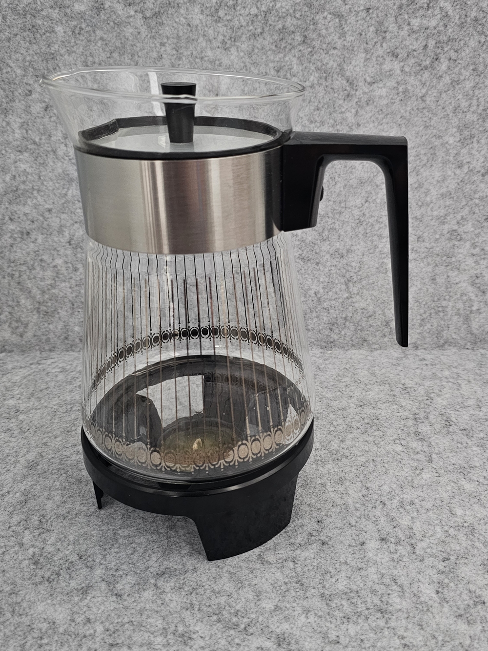 Glass Coffee Carafe with Black Handle and Stainless Accent